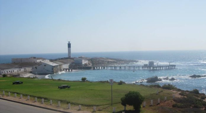 The lighthouse and previous crayfish factory in Doring Bay