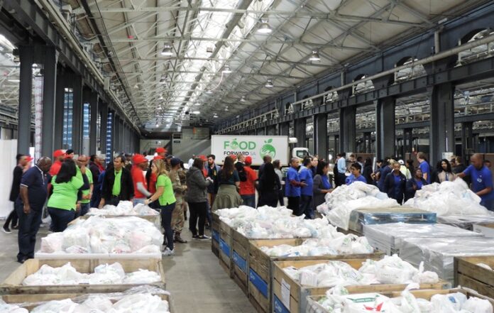 Volunteers give their 67 minutes at the Mandela Day FoodForward SA Food Drive at the Durban Exhibition Centre