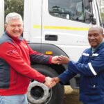 Boshoek Smelter GM Riaan Cilliers and recipient Julius Ranyabu